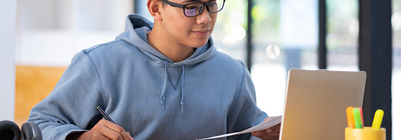 Student studying with laptop